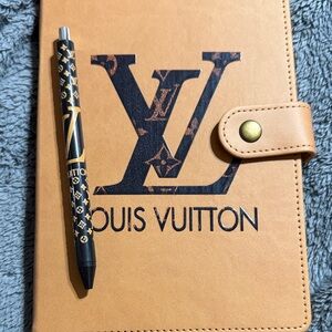 Tan and Black Notebook with Pen